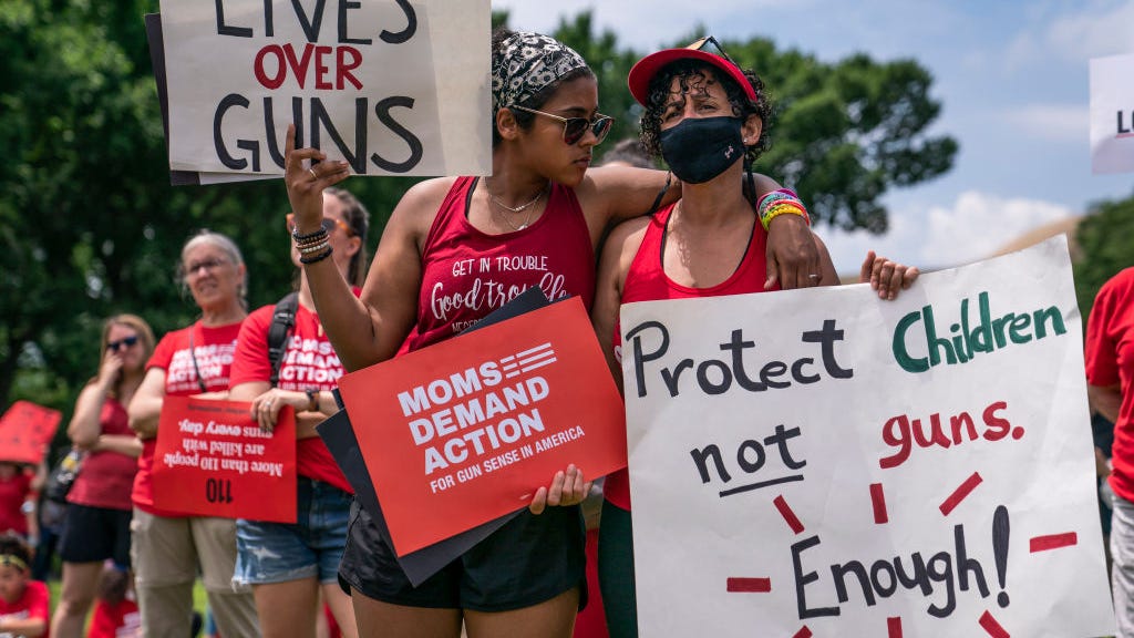 More women support stricter gun laws than men