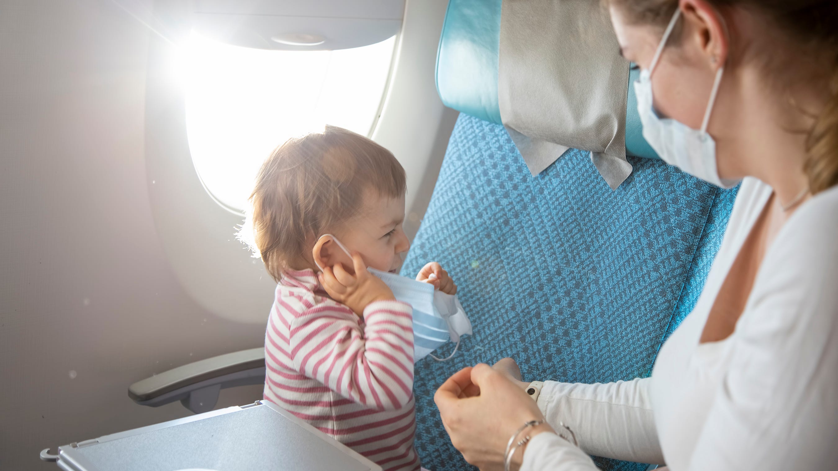 A flight attendant told mom of 2-year-old to glue on her child’s mask