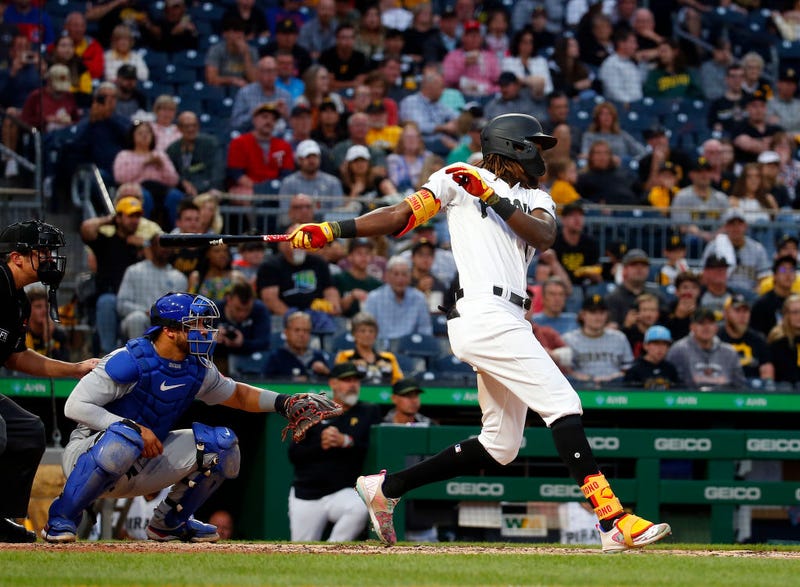 PITTSBURGH, PA - JUNE 20: Oneil Cruz #15 of the Pittsburgh Pirates hits a RBI single in the seventh inning against the Chicago Cubs during the game at PNC Park on June 20, 2022 in Pittsburgh, Pennsylvania.