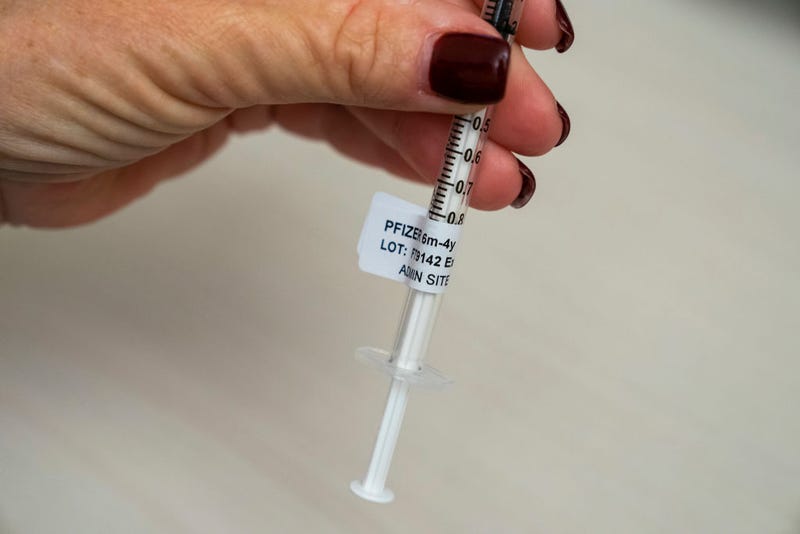A nurse holds a syringe that contains a dose of the Pfizer Covid-19 vaccine for children under age five at UW Medical Center - Roosevelt on June 21, 2022 in Seattle, Washington. Covid-19 vaccinations for children younger than 5 began today across the U.S. (Photo by David Ryder/Getty Images)