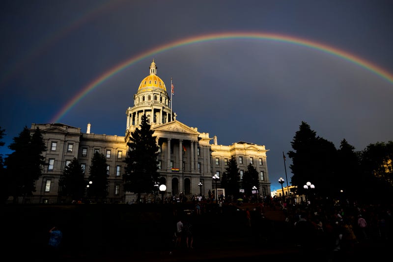 A rainbow forms above the Colorado State Capitol as people gather in protest of the Supreme Court's decision to overturn Roe v. Wade on June 24, 2022, in Denver, Colorado.