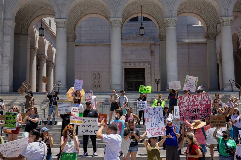 Protesters denounce the U.S. Supreme Court's decision to end abortion rights protections at the steps of City Hall on June 25, 2022 in Los Angeles, California.