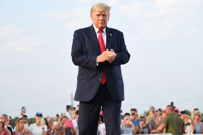 Donald Trump arrives to give remarks during a Save America Rally with former US President Donald Trump at the Adams County Fairgrounds on June 25, 2022 in Mendon, Illinois.