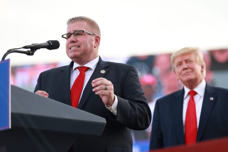 Illinois Gubernatorial hopeful Darren Bailey delivers remarks after receiving an endorsement from Donald Trump during a Save America Rally with former US President Donald Trump at the Adams County Fairgrounds on June 25, 2022 in Mendon, Illinois.