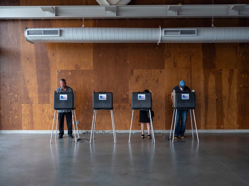 Voters cast their ballots on Primary Day at the No. 571 Boathouse on June 28, 2022, in Chicago.