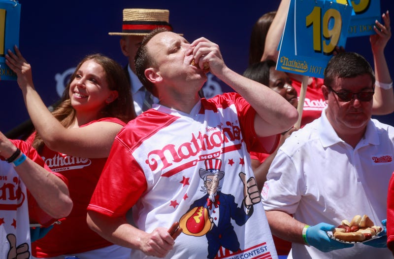 Joey Chestnut eats hot dogs during the 2022 Nathans Famous Fourth of July International Hot Dog Eating Contest on July 4, 2022 at Coney Island in the Brooklyn borough of New York City