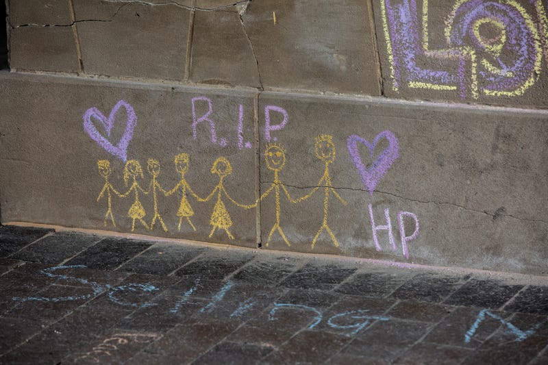 Chalk drawing memorializing victims of Highland Park shooting