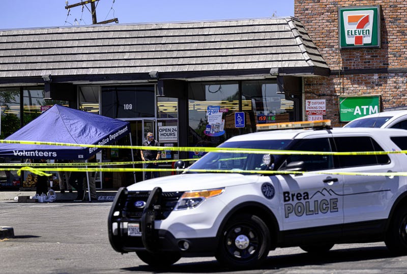 Police investigate the fatal shooting of a clerk at a Brea 7-Eleven on Monday, July 11, 2022, during a robbery. Police believe the crime is tied to a shooting and robbery at a 7-Eleven in La Habra.