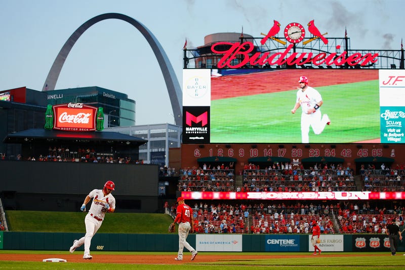 Cardinals at Busch Stadium, arch in the background