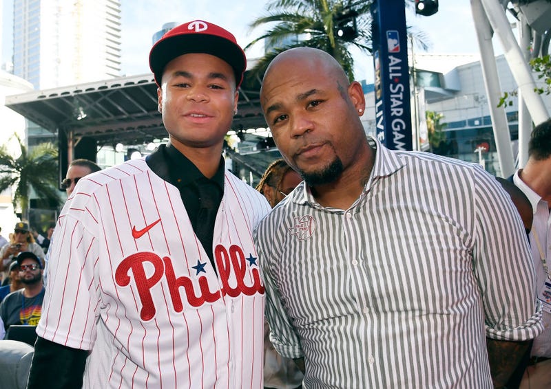 Justin Crawford poses with father Carl Crawford