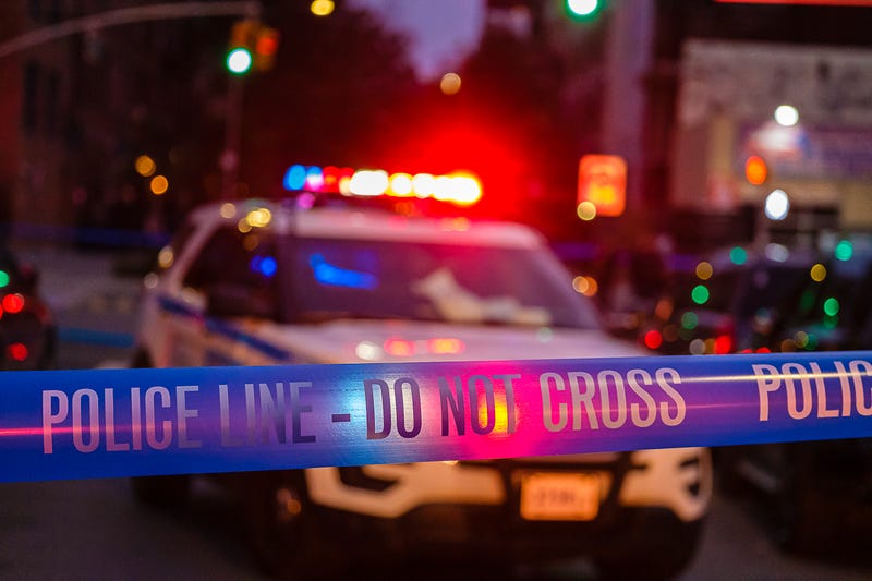 NYPD car and police tape