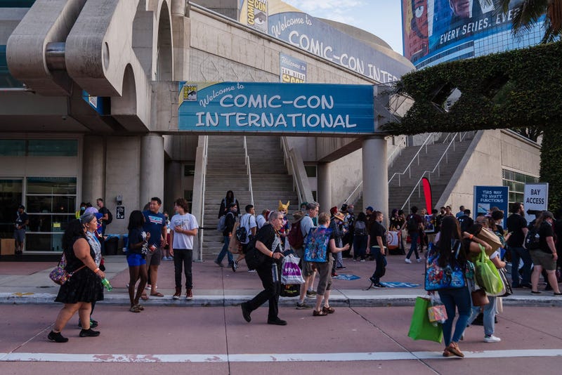 People walk in front of the San Diego Convention Center where Comic Con is being held on July 21, 2022 in San Diego, California.