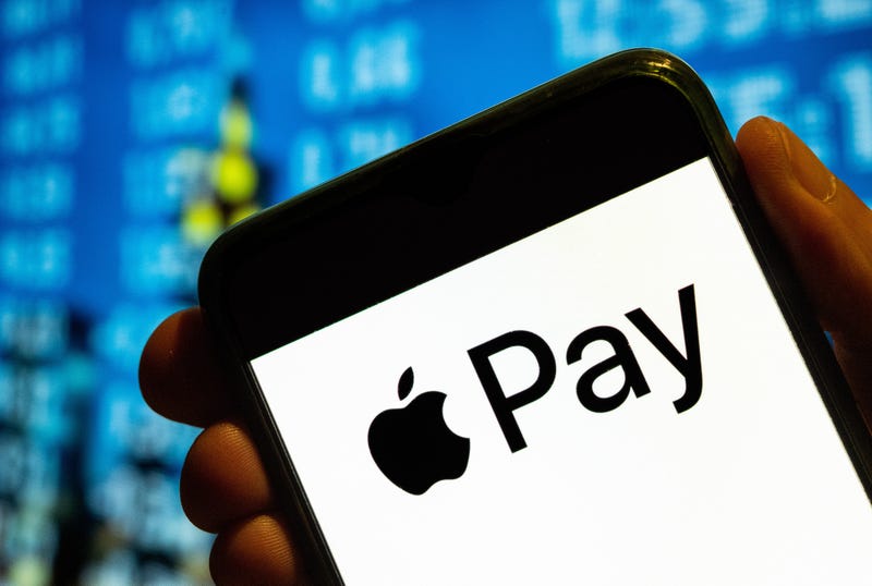 In this photo illustration, the mobile payment and digital wallet service by Apple, Apple Pay, logo is displayed on a smartphone screen.