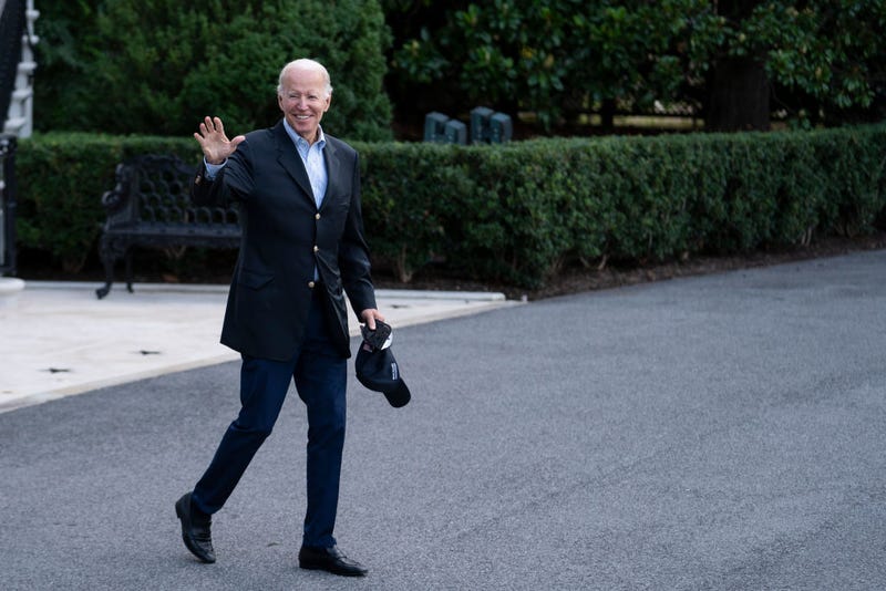 U.S. President Joe Biden waves to members of the press on the South Lawn of the White House before walking to Marine One for a trip to Delaware on August 7, 2022 in Washington, D.C.