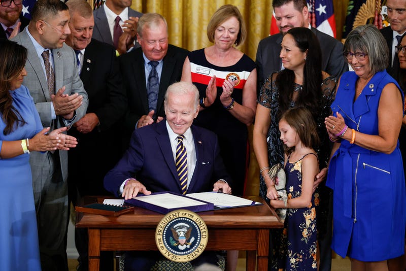 U.S. President Joe Biden smiles after signing The PACT Act in the East Room of the White House August 10, 2022 in Washington, D.C.