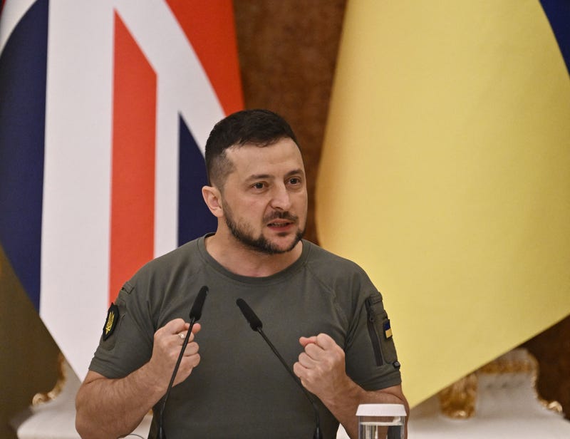Ukrainian President Volodymyr Zelensky reacts during a press conference with British Prime Minister Boris Johnson in Kyiv on Ukraine's Independence Day on August 24, 2022, amid Russia's invasion of Ukraine. - British Prime Minister Boris Johnson was in Kyiv on August 24, 2022, hailing the "strong will of Ukrainians to resist" Russia's invasion, as the nation celebrates its Independence Day and marks the milestone of six months of war.