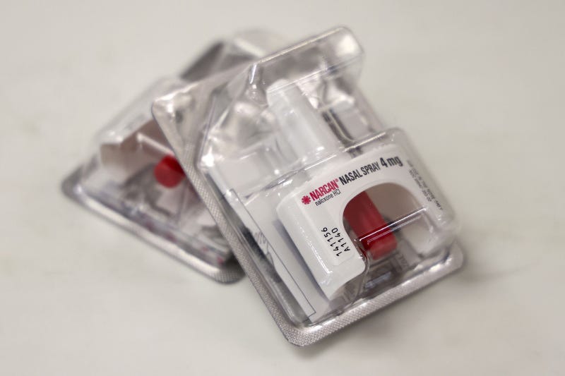 The two doses of Narcan which can be given for a opioid overdose in an emergency situation.