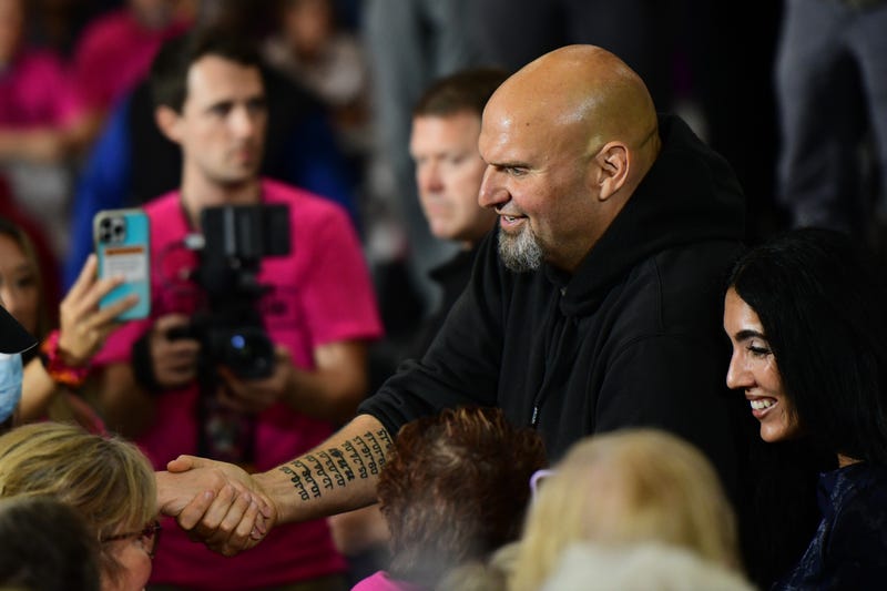 Democratic Pennsylvania Senate nominee John Fetterman greets supporters during a rally with U.S. Congresswomen Madeleine Dean and Mary Gay Scanlon on September 11, 2022 at Montgomery County Community College in Blue Bell, Pennsylvania.