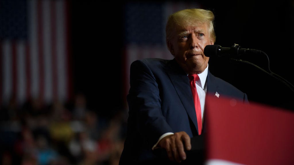 Trump allies don’t understand why he continues to embrace Q