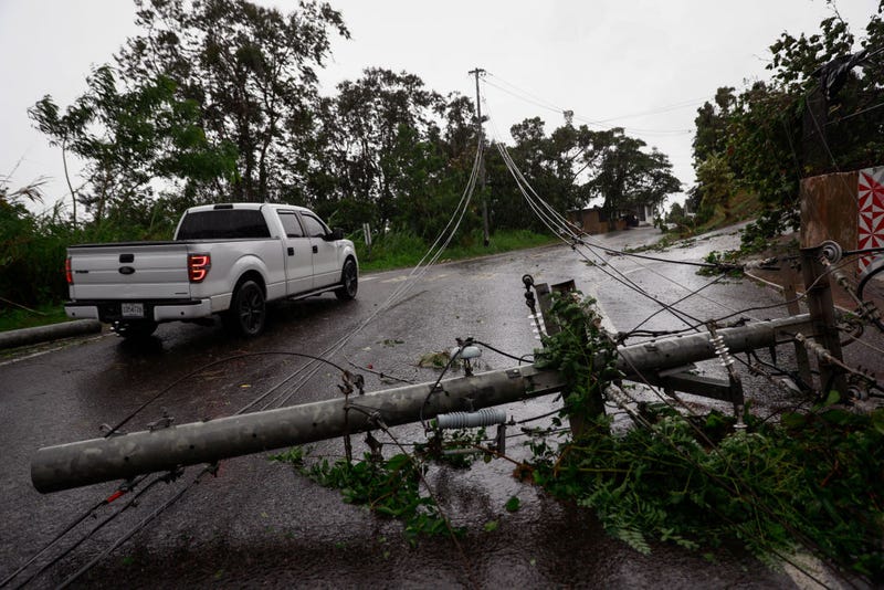 Downed power lines on road PR-743 in Cayey ,Puerto Rico as the island awoke to a general power outage on September 19, 2022 in San Juan, Puerto Rico.