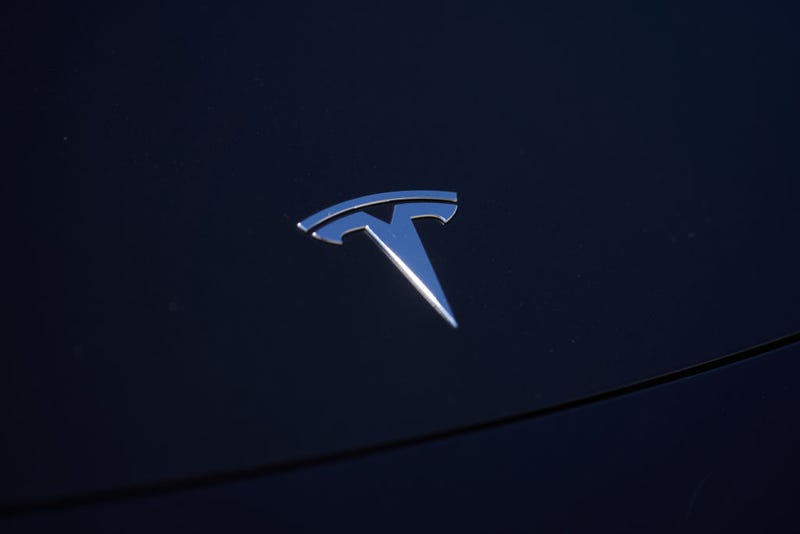 A Tesla logo is seen on a vehicle in a parking lot on September 22, 2022 in Santa Monica, California. 