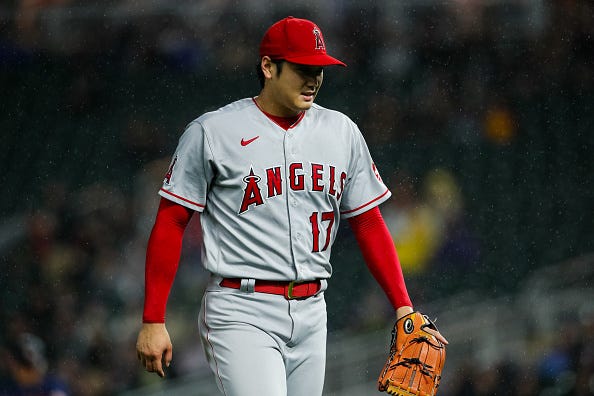Shohei Ohtani models the road uniforms of the Angels.