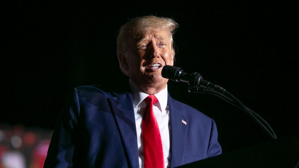 Trump rides out Hurricane Ian at Mar-a-Lago to avoid deposition