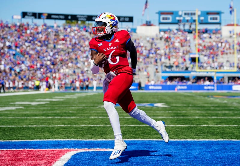 Jalon Daniels #6 of the Kansas Jayhawks scores a touchdown during the second half against the Duke Blue Devils at David Booth Kansas Memorial Stadium on September 24, 2022 in Lawrence, Kansas. Kansas defeated Duke 35-27.