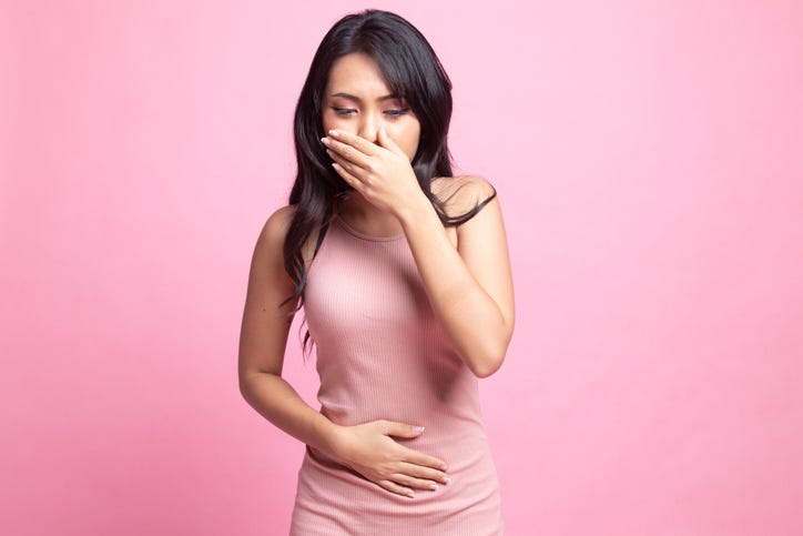 Woman getting sick