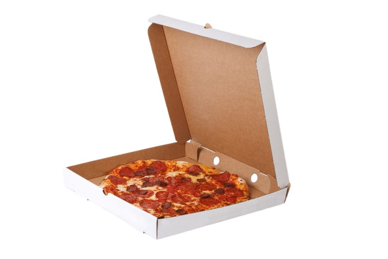 Fresh pizza in plain open box isolated on white background