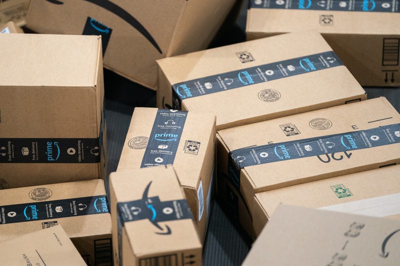 Packages on a conveyer belt at an Amazon sorting facility