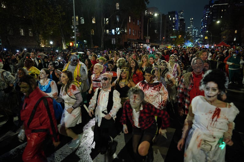 Revelers at the 2022 Village Halloween Parade. This year's parade is expected to be chilly but mostly dry before rain arrives overnight