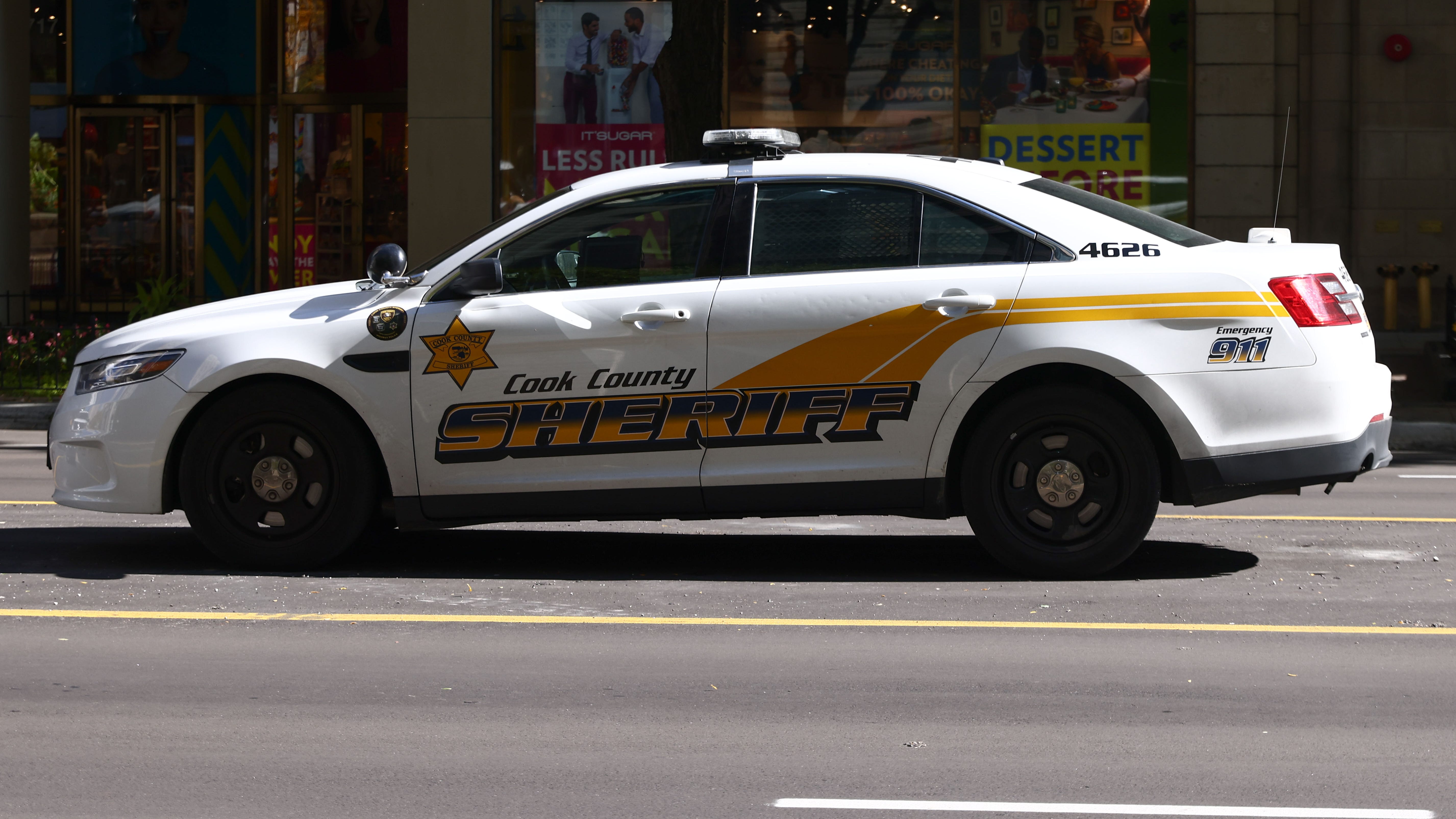 Caught on tape: Cook County sheriff’s officers stole NASCAR banners, video shows