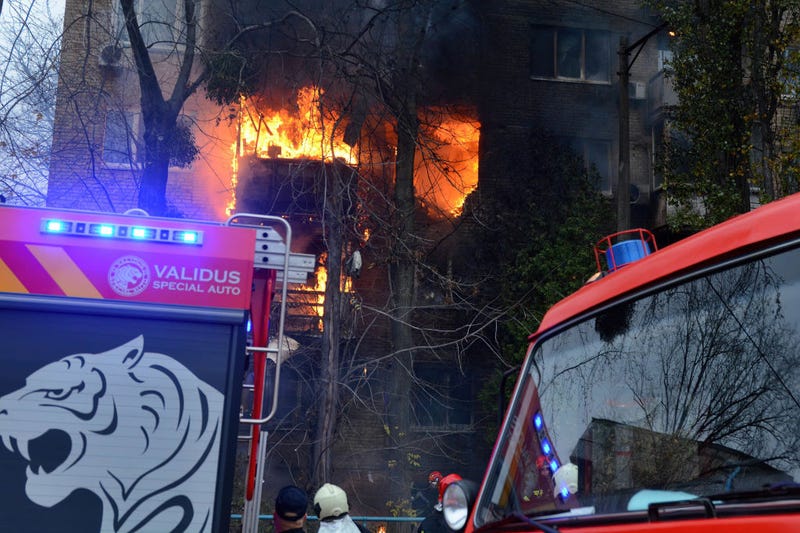 KYIV, UKRAINE - 2022/11/15: A fire is seen at a residential building hit by a Russian strike amid Russia's attack on Ukraine in Kyiv.