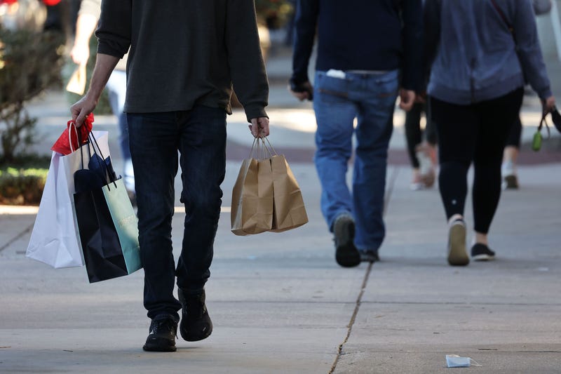 People shop for holiday gifts.