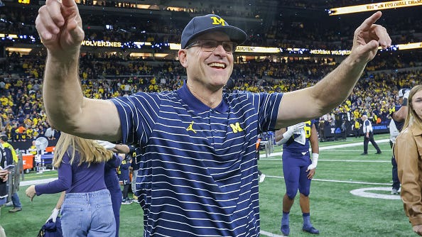Jim Harbaugh says he is staying at Michigan