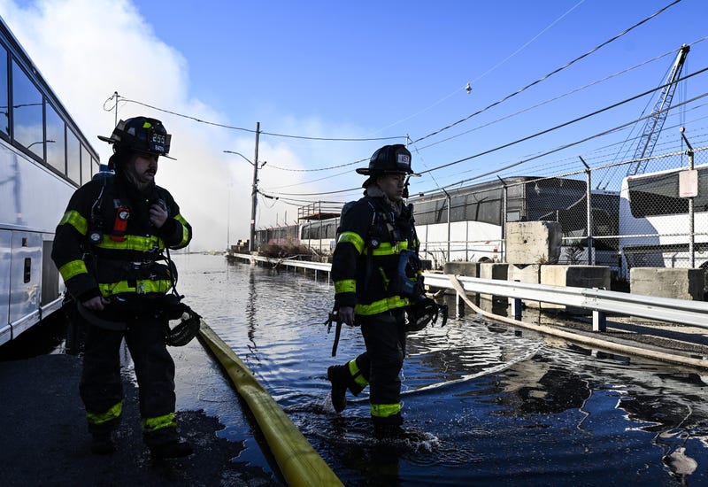 A view of the site as a massive fire broke out at an NYPD impound and evidence storage warehouse in Brooklyn on December 13, 2022 in Brooklyn. 