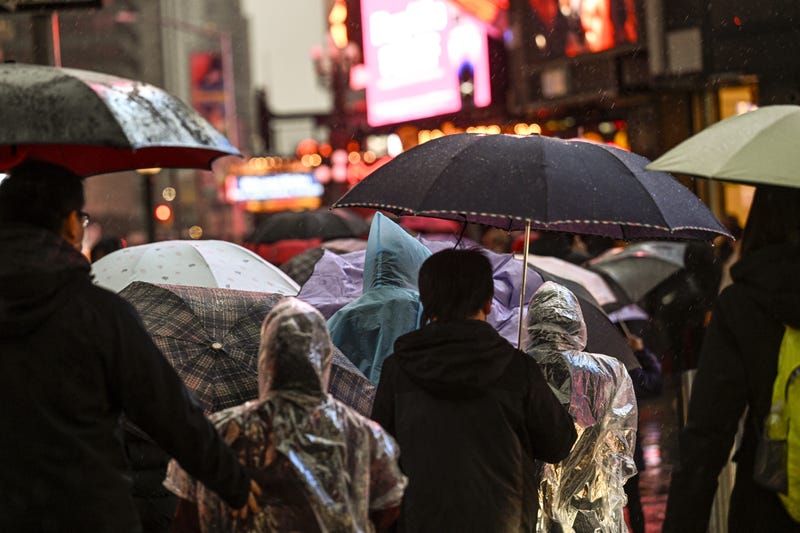 People walk through the rain in Manhattan