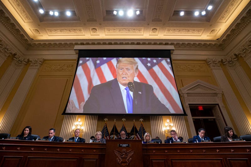  Former U.S. President Donald Trump is displayed on a screen during a meeting of the Select Committee to Investigate the January 6th Attack on the U.S. Capitol in the Canon House Office Building on Capitol Hill on December 19, 2022 in Washington, DC. The committee is expected to approve its final report and vote on referring charges to the Justice Department of insurrection, obstruction of an official proceeding of Congress and conspiracy to defraud the United States against former President Donald Trump. (Photo by Al Drago/Getty Images)