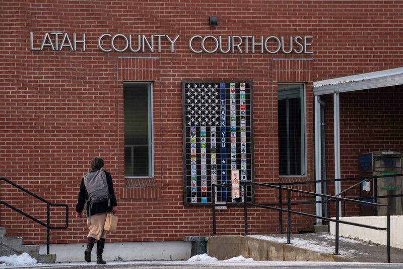 person walks into the latah county courthouse