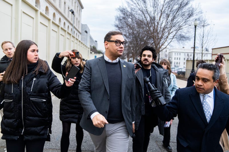 Rep. George Santos, R-N.Y., leaves a meeting of the House Republican Conference at the Capitol Hill Club on Wednesday, January 25, 2023. 