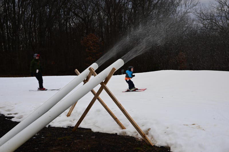 Fake snow is produced at Spring Mountain Adventures Ski Resort on Jan. 20, 2023, in Schwenksville, Pennsylvania.
