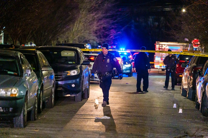New York Police Department police search for evidence as they investigate the shooting of an off-duty police officer on Ruby Street in Brooklyn, Saturday, Feb. 4, 2023.