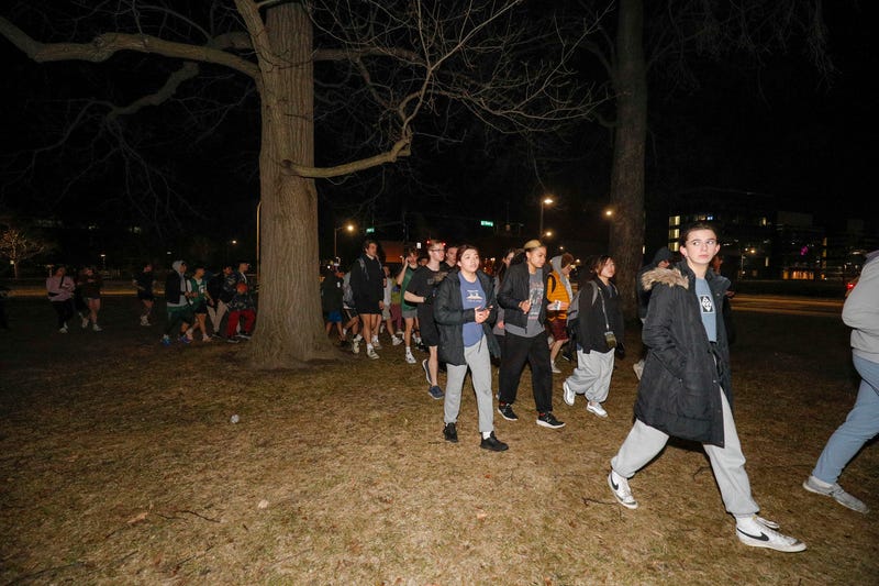 Michigan State University students evacuate to a safe area during an active shooter situation