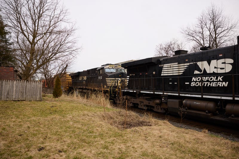 EAST PALESTINE, OH - FEBRUARY 14: A Norfolk Southern train is en route on February 14, 2023 in East Palestine, Ohio. Another train operated by the company derailed on February 3, releasing toxic fumes and forcing evacuation of residents.