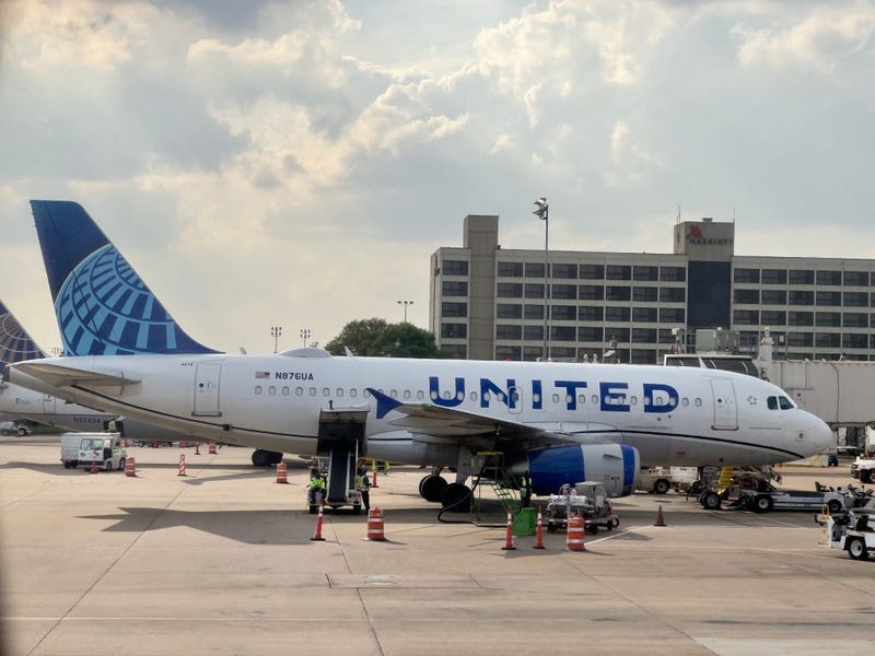 This photograph taken on March 8, 2023 shows a United airlines Airbus A319-132 aircraft parked at the gate at George Bush International Airport in Houston, Texas. 