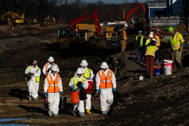 Ohio EPA and EPA contractors collect soil and air samples from the derailment site