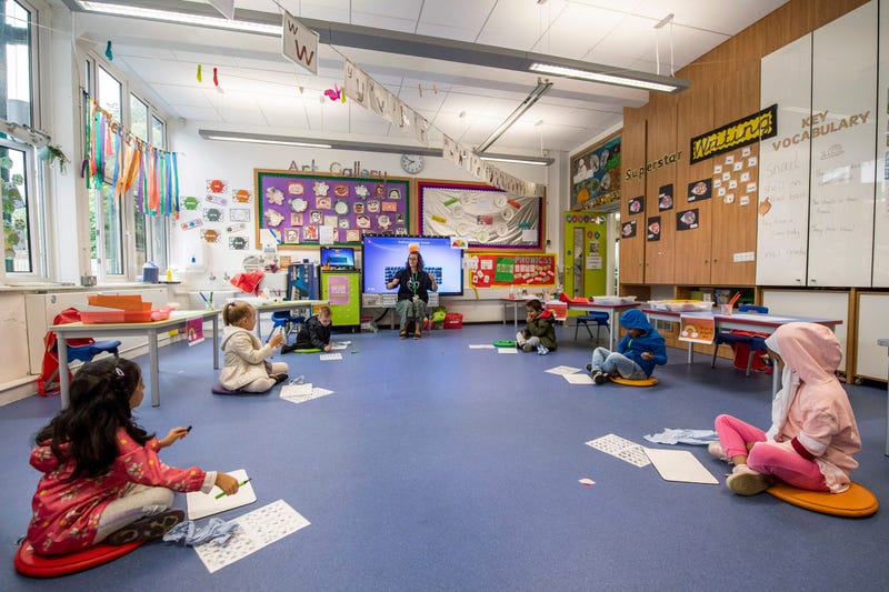 Classroom with socially-distanced children