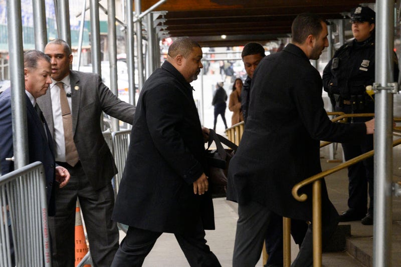 Manhattan District Attorney Alvin Bragg (C) arrives at the Manhattan District Attorney's Office in Manhattan on March 22, 2023