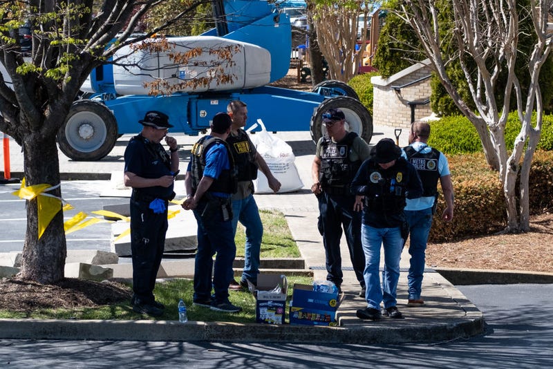 Law enforcement officers stand outside of Woodmont Baptist Church while waiting for children to be reunited with their families after a mass shooting at The Covenant School on March 27, 2023 in Nashville, Tennessee. According to initial reports, three students and three adults were killed by the shooter, a 28-year-old woman. The shooter was killed by police responding to the scene. (Photo by Seth Herald/Getty Images)